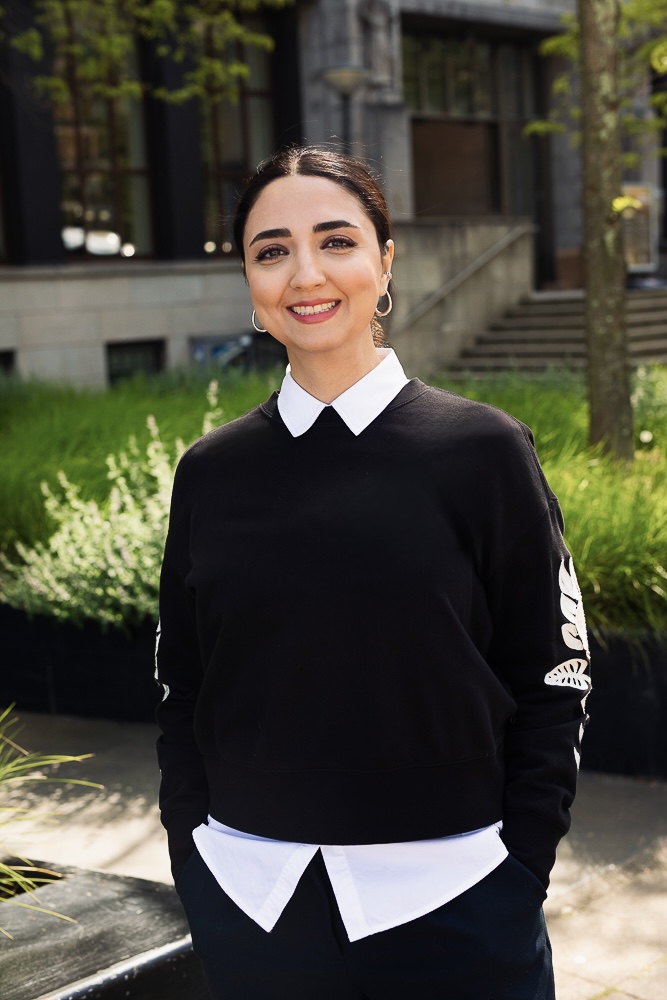 Negin Bokaei standing outdoors, smiling.